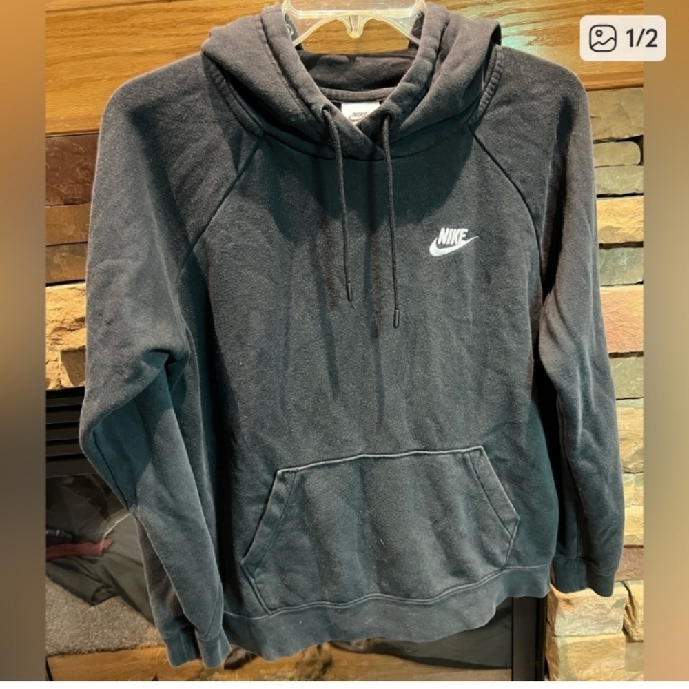 Nike Hoodie Black. It's a Men's M but It seems more like a small to me